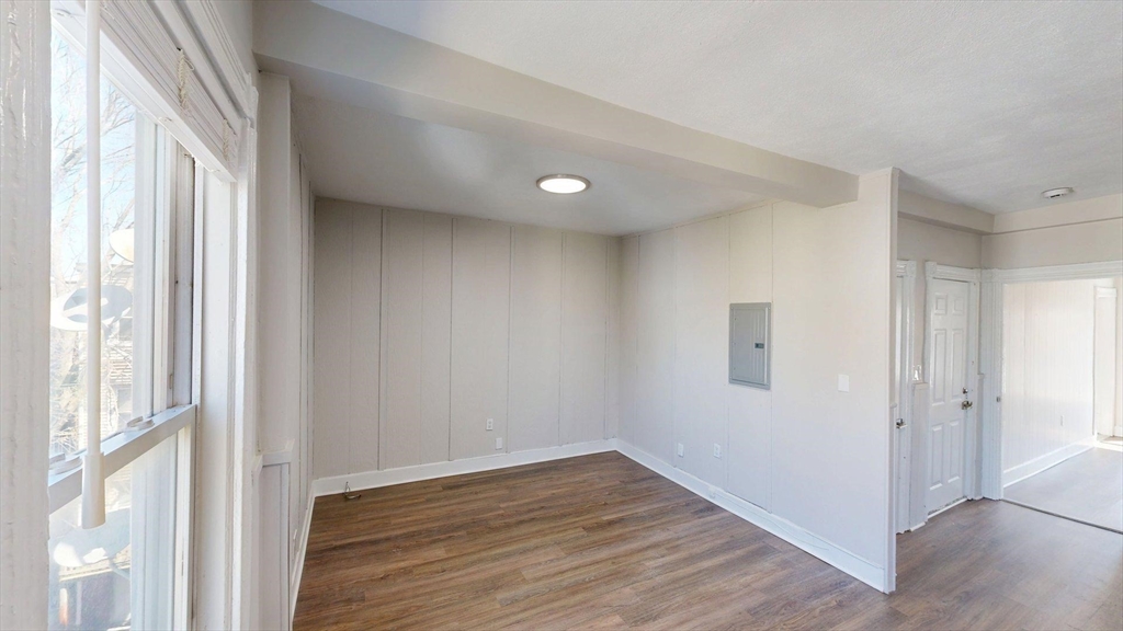 44 Morris Street, Unit 2 Boston, MA 02128 - Photo 3 of 23 a view of a livingroom with wooden floor