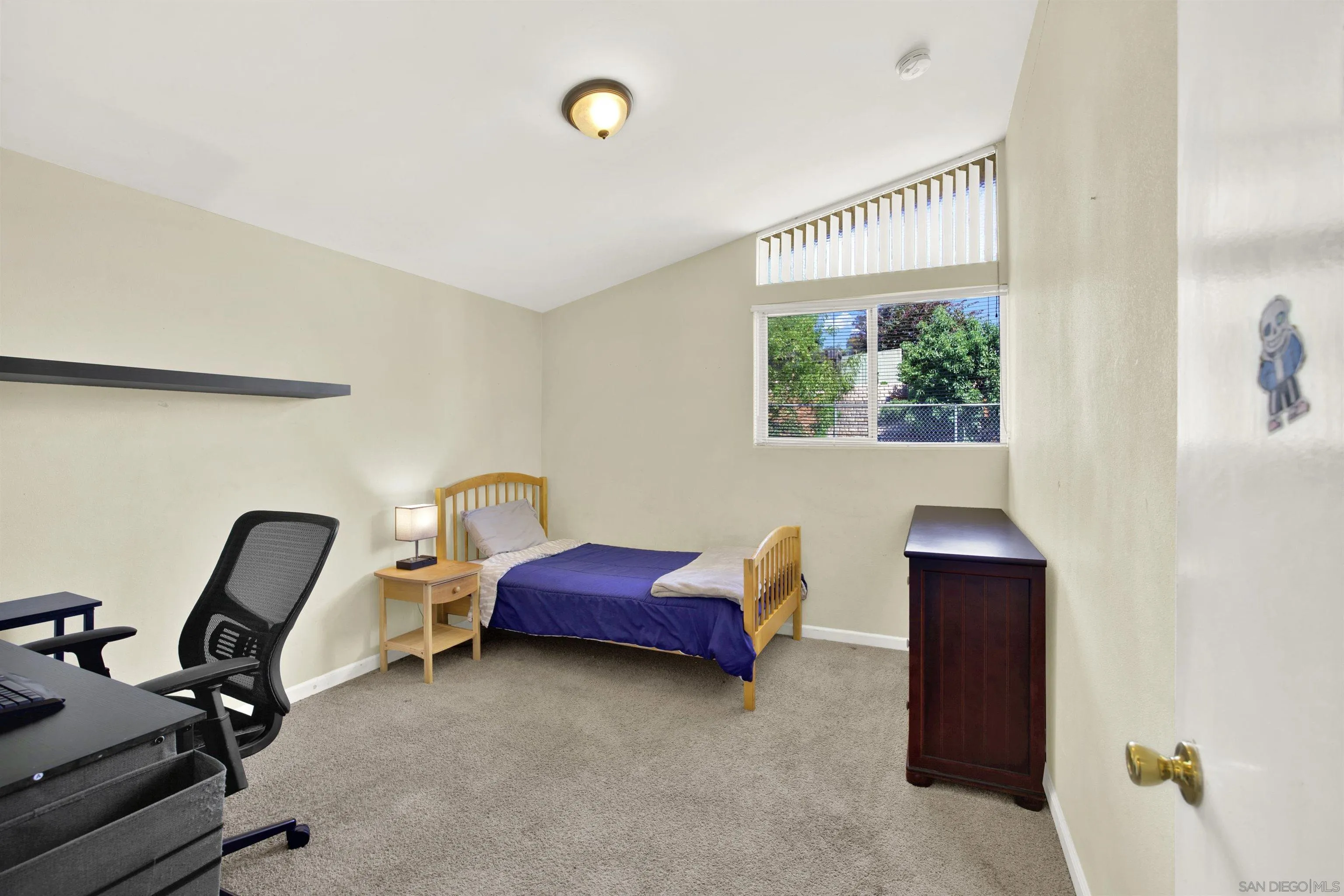 13951 Powers Road Poway, CA 92064 - Photo 19 of 27 a view of a workspace with furniture and a window