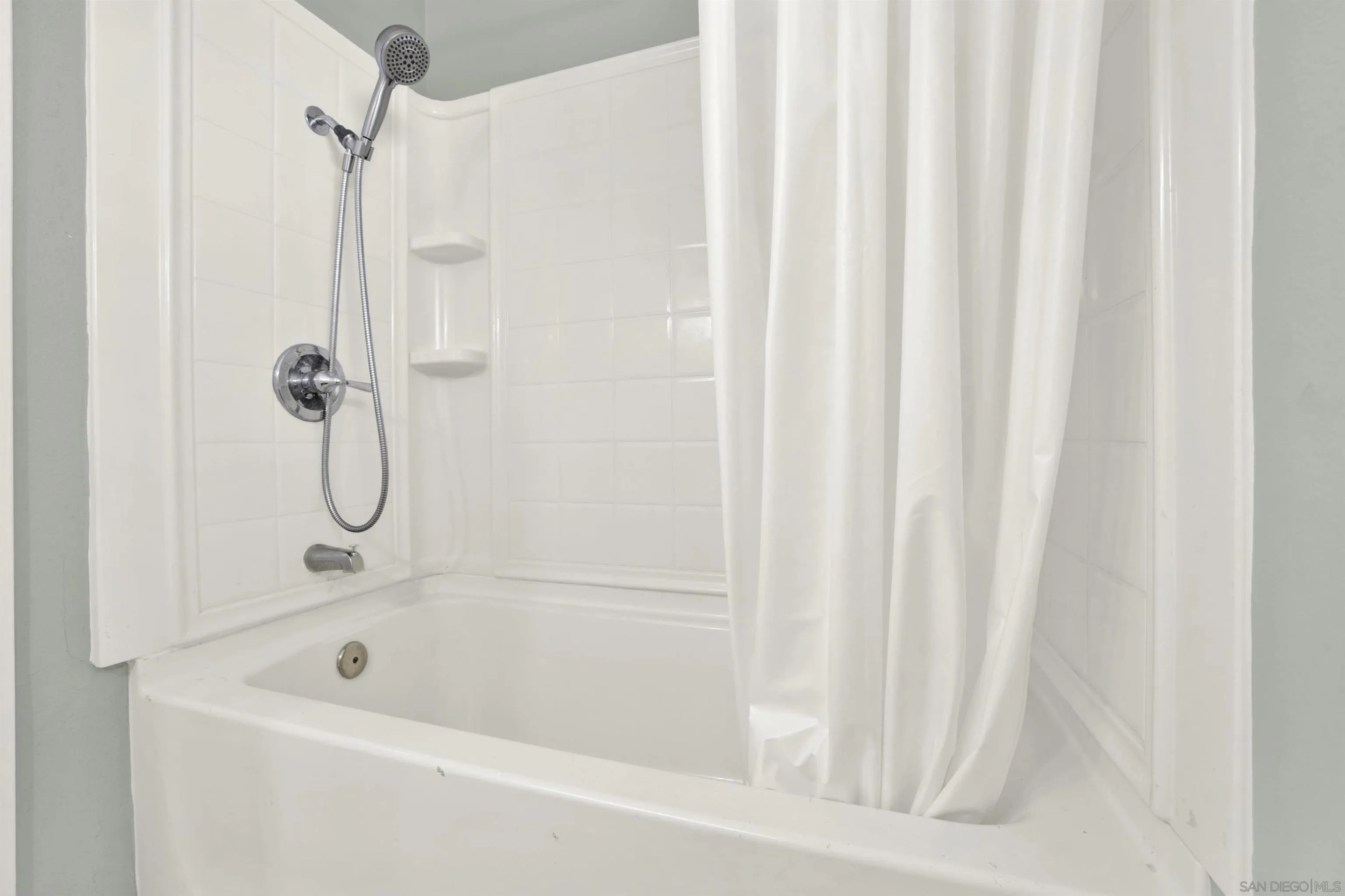 13951 Powers Road Poway, CA 92064 - Photo 21 of 27 a bath tub sitting next to a shower