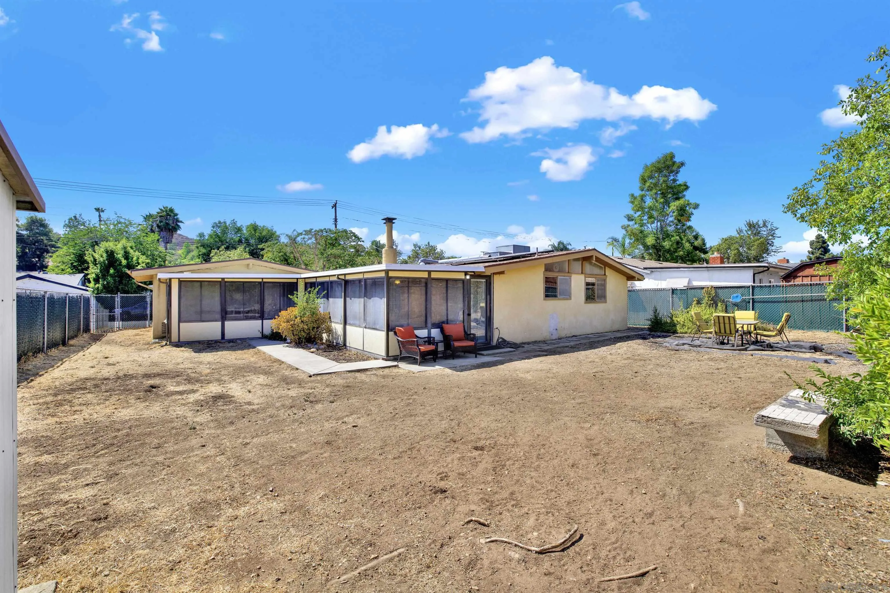 13951 Powers Road Poway, CA 92064 - Photo 23 of 27 a view of a house with backyard and sitting area