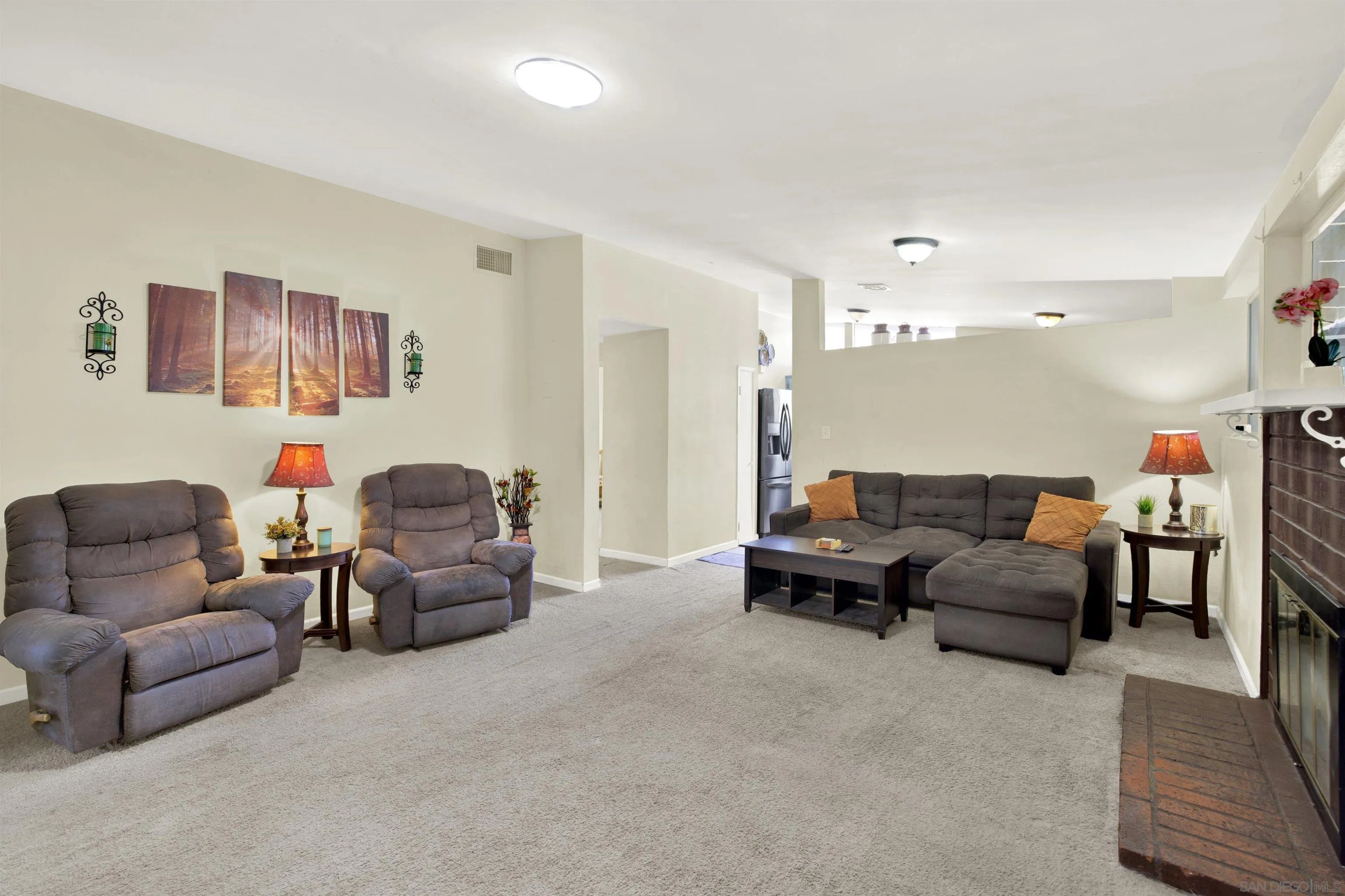 13951 Powers Road Poway, CA 92064 - Photo 7 of 27 a living room with furniture and a couch