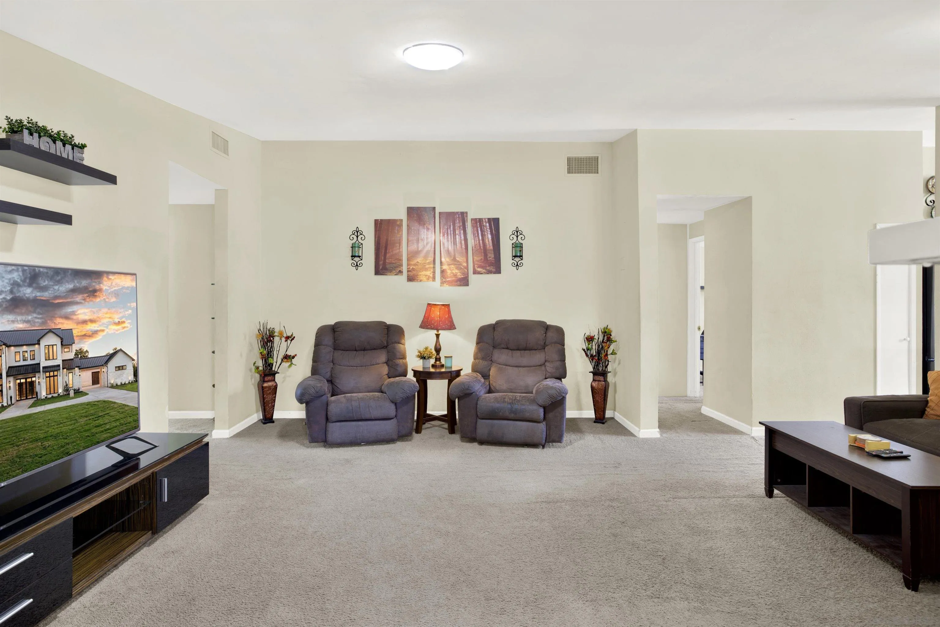 13951 Powers Road Poway, CA 92064 - Photo 8 of 27 a living room with furniture and a flat screen tv