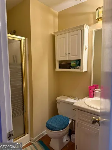 a bathroom with a sink and a toilet