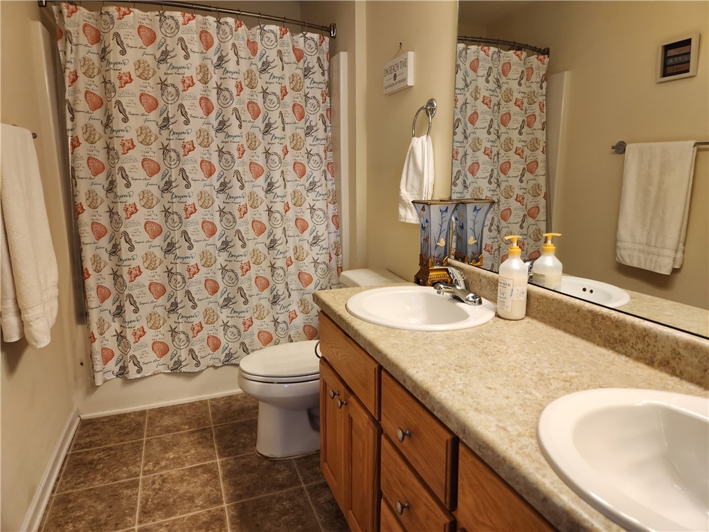 312 Killdevil Hill, Unit A Six Mile, SC 29682 - Photo 19 of 44 Master bathroom has double sinks, oversized garden