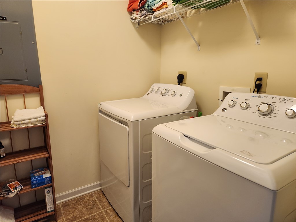312 Killdevil Hill, Unit A Six Mile, SC 29682 - Photo 25 of 44 Laundry room right off the kitchen and pantry. Bra