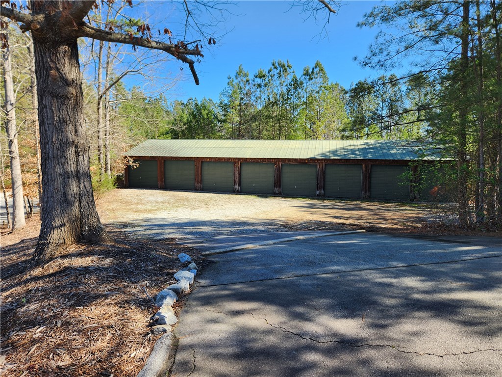 312 Killdevil Hill, Unit A Six Mile, SC 29682 - Photo 28 of 44 Garage/storage Unit #4 conveys, 26 ft deep and per