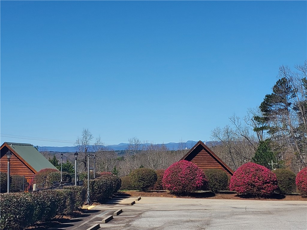 312 Killdevil Hill, Unit A Six Mile, SC 29682 - Photo 29 of 44 Mature Landscaping is cared for by the HOA.