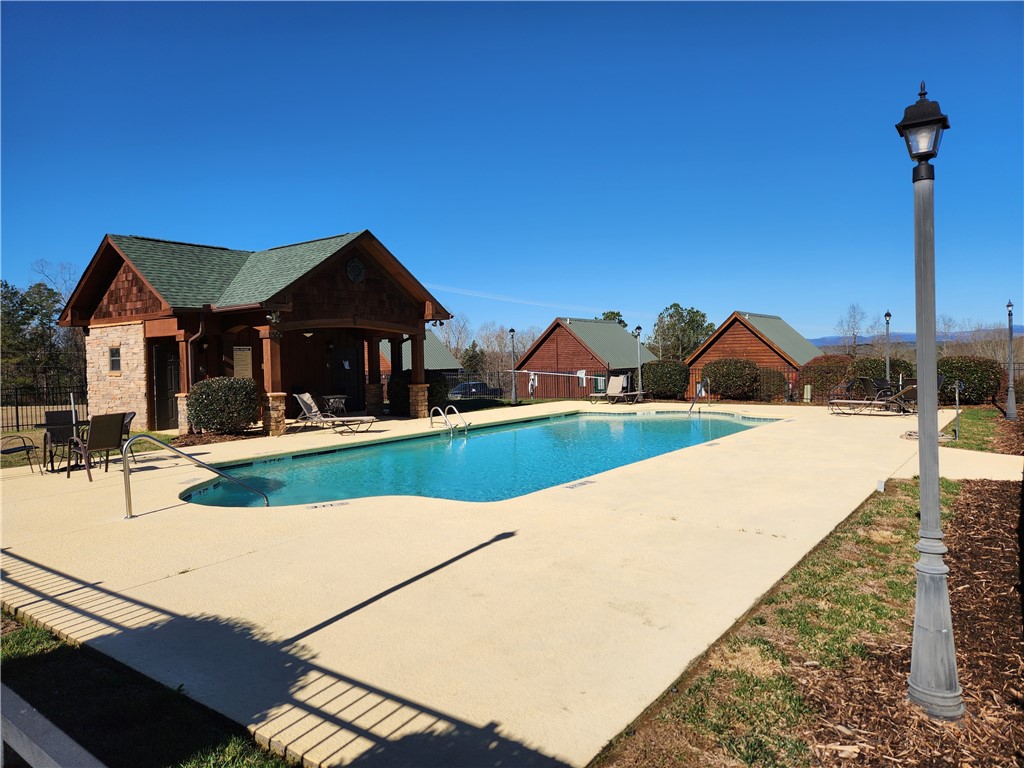 312 Killdevil Hill, Unit A Six Mile, SC 29682 - Photo 5 of 44 Additional parking just outside the pool.