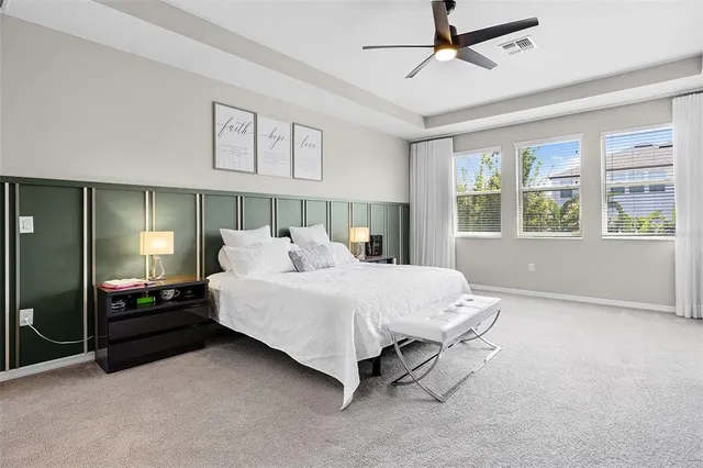 a bed room with a bed and window