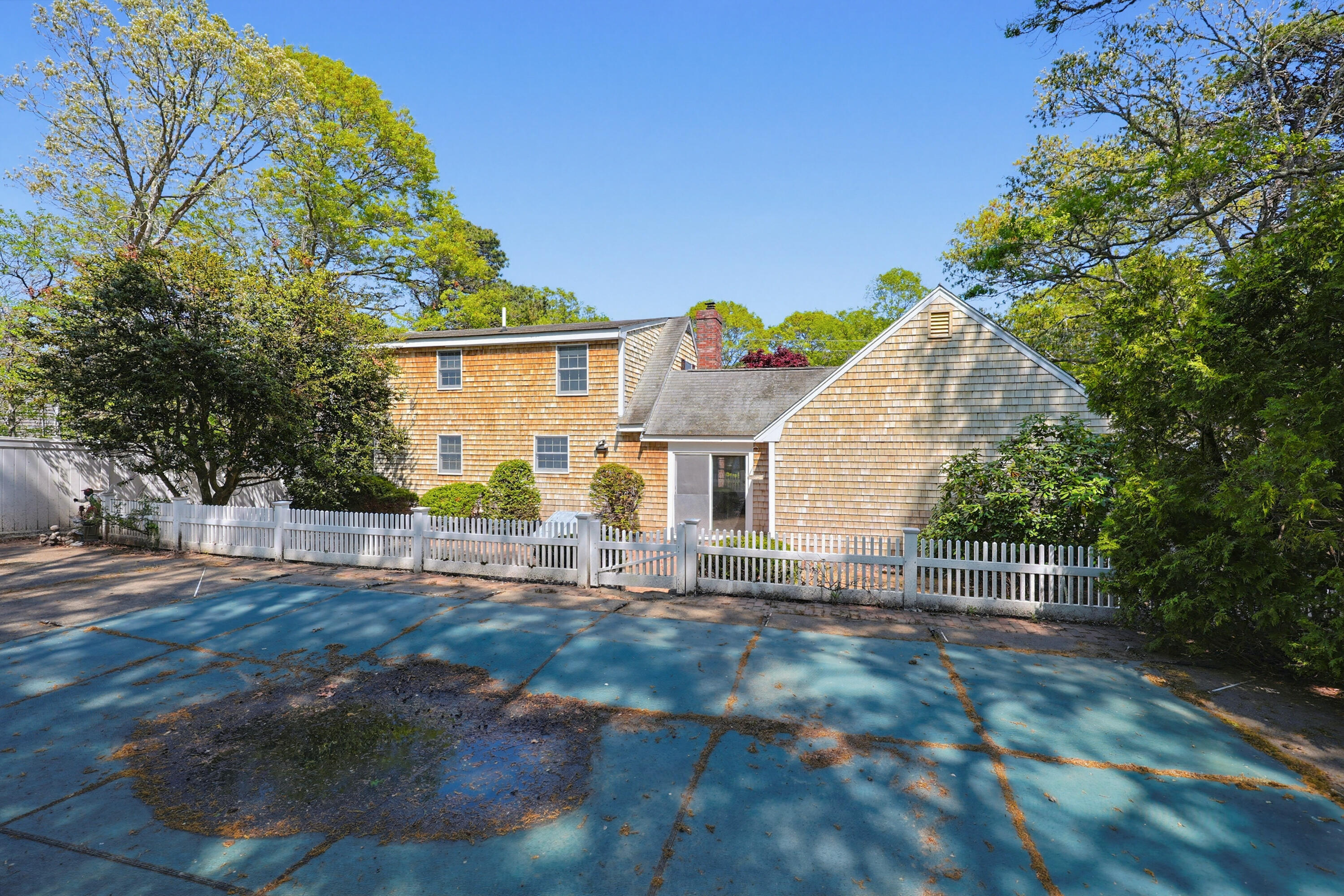 556 Cotuit Road Mashpee, MA 02649 - Photo 35 of 45 a view of a house with a yard