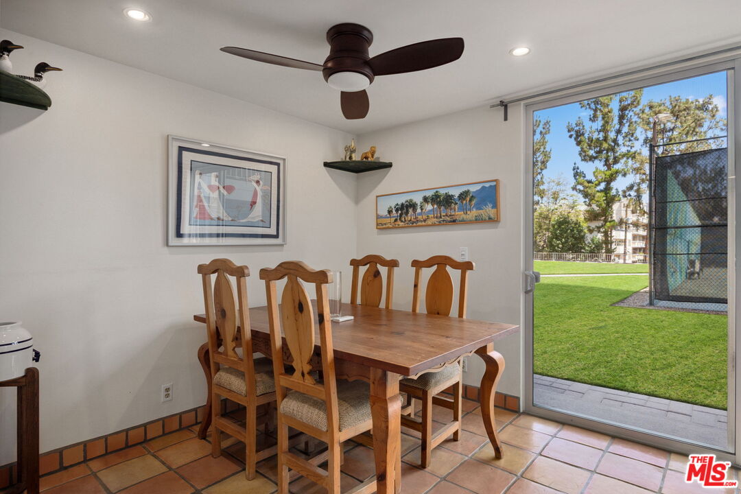 100 South Doheny Drive, Unit 214 Los Angeles, CA 90048 - Photo 4 of 17 a view of a dining room with furniture window and outside view