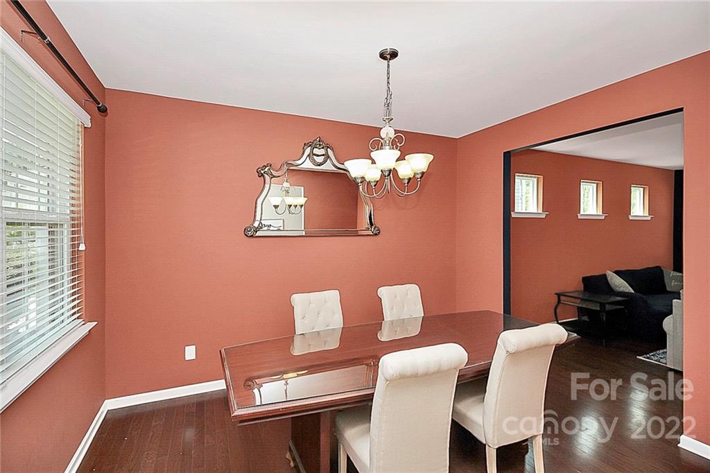 78134 Rillstone Drive Lancaster, SC 29720 - Photo 16 of 26 a view of a dining room with furniture and chandelier