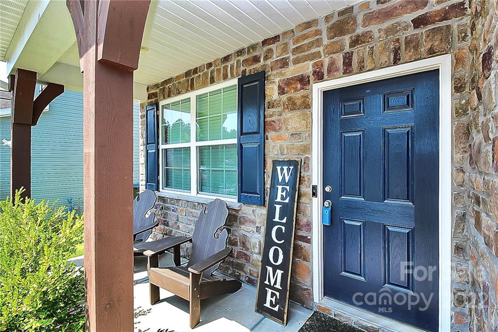 78134 Rillstone Drive Lancaster, SC 29720 - Photo 2 of 26 a front view of a house with outdoor seating