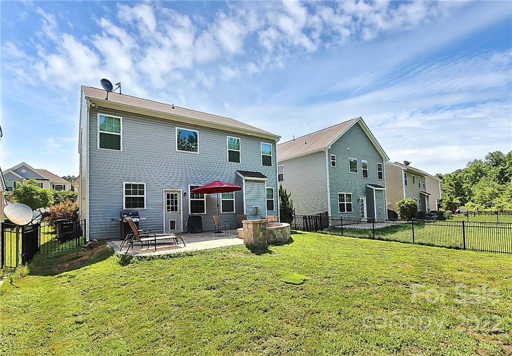 78134 Rillstone Drive Lancaster, SC 29720 - Photo 25 of 26 a front view of house with a garden