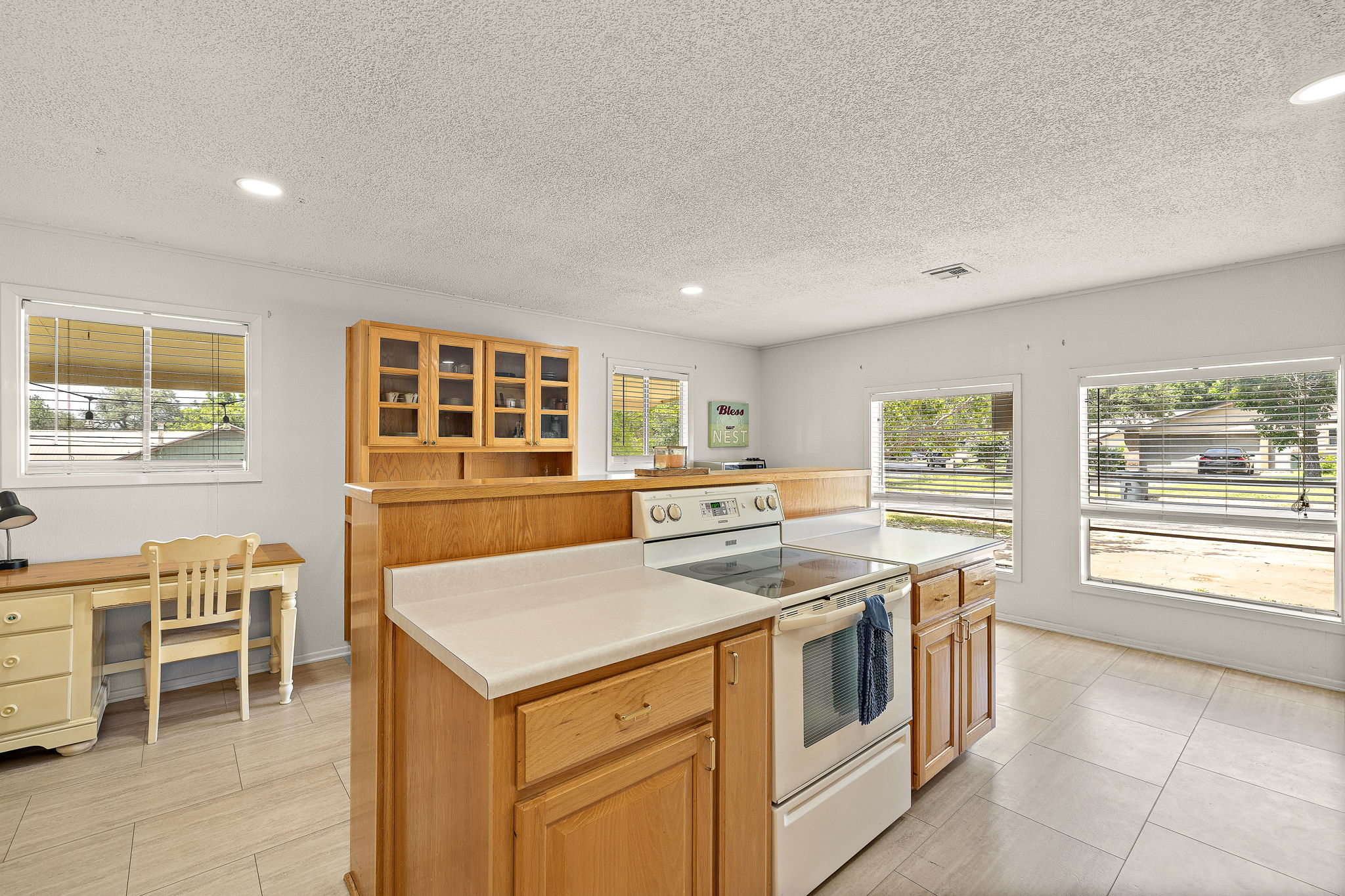 605 Parkway Street Georgetown, TX 78628 - Photo 14 of 31 Natural light fills the kitchen