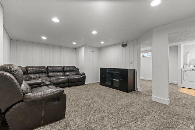 2101 West 3900th Street South Roy, UT 84067 - Photo 29 of 36 Spacious recreation area featuring recessed lighting, vertical paneling, and a neutral carpet