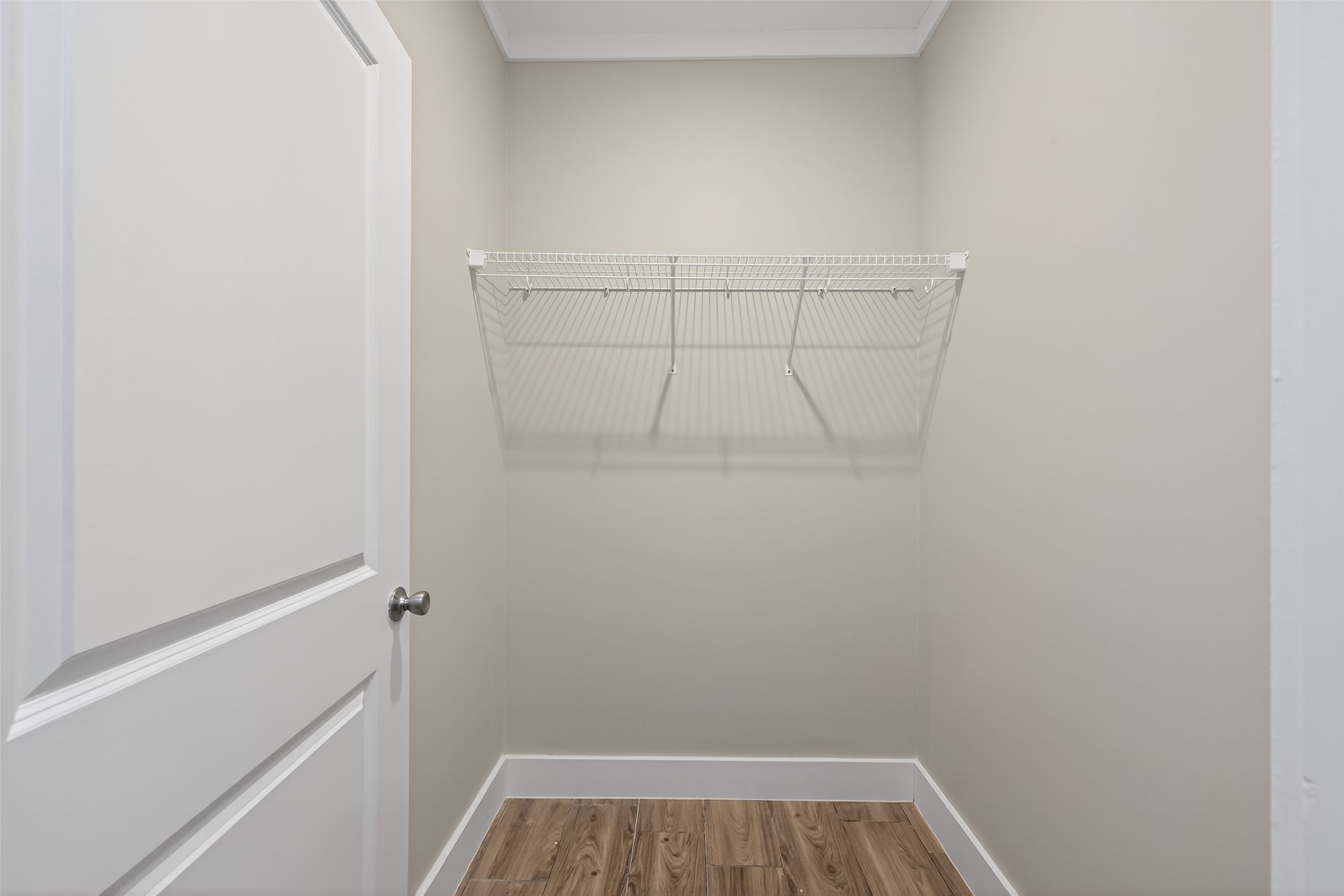 6605 Greenhurst Street Houston, TX 77091 - Photo 21 of 41 a view of storage and utility room with racks on the wall