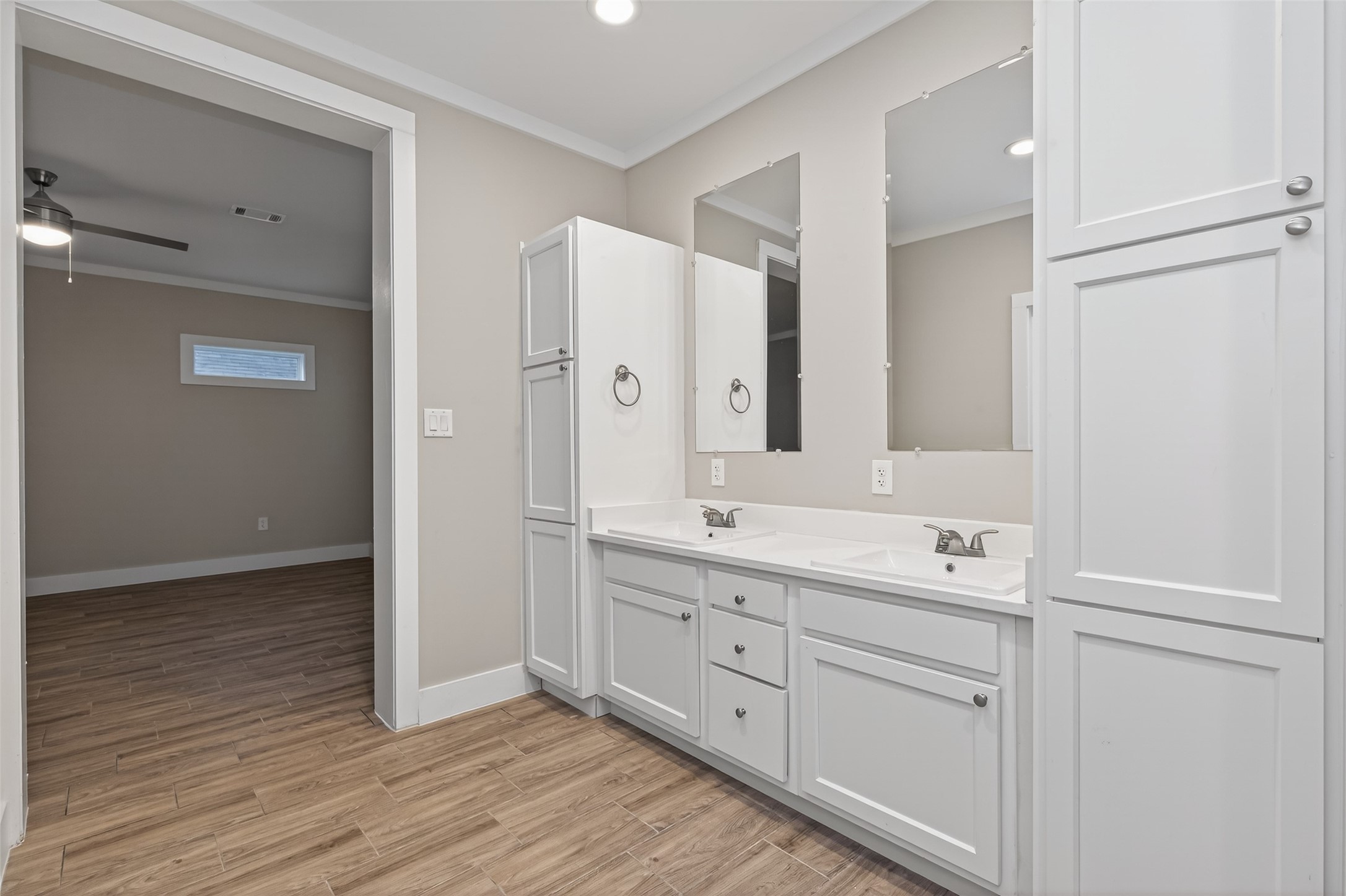 6605 Greenhurst Street Houston, TX 77091 - Photo 36 of 41 a spacious bathroom with a double vanity sink a mirror and a shower