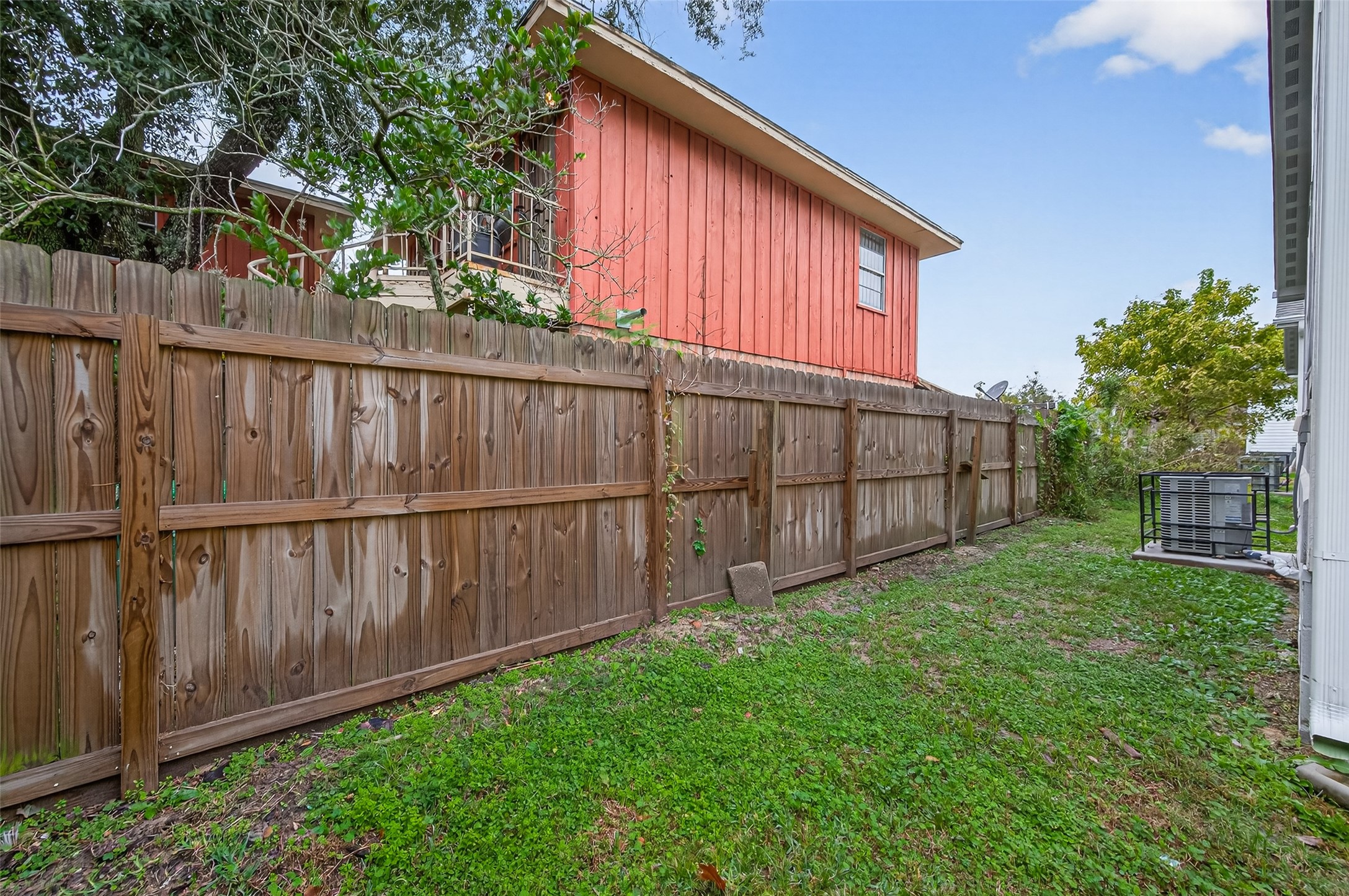 6605 Greenhurst Street Houston, TX 77091 - Photo 38 of 41 a view of a backyard with wooden fence