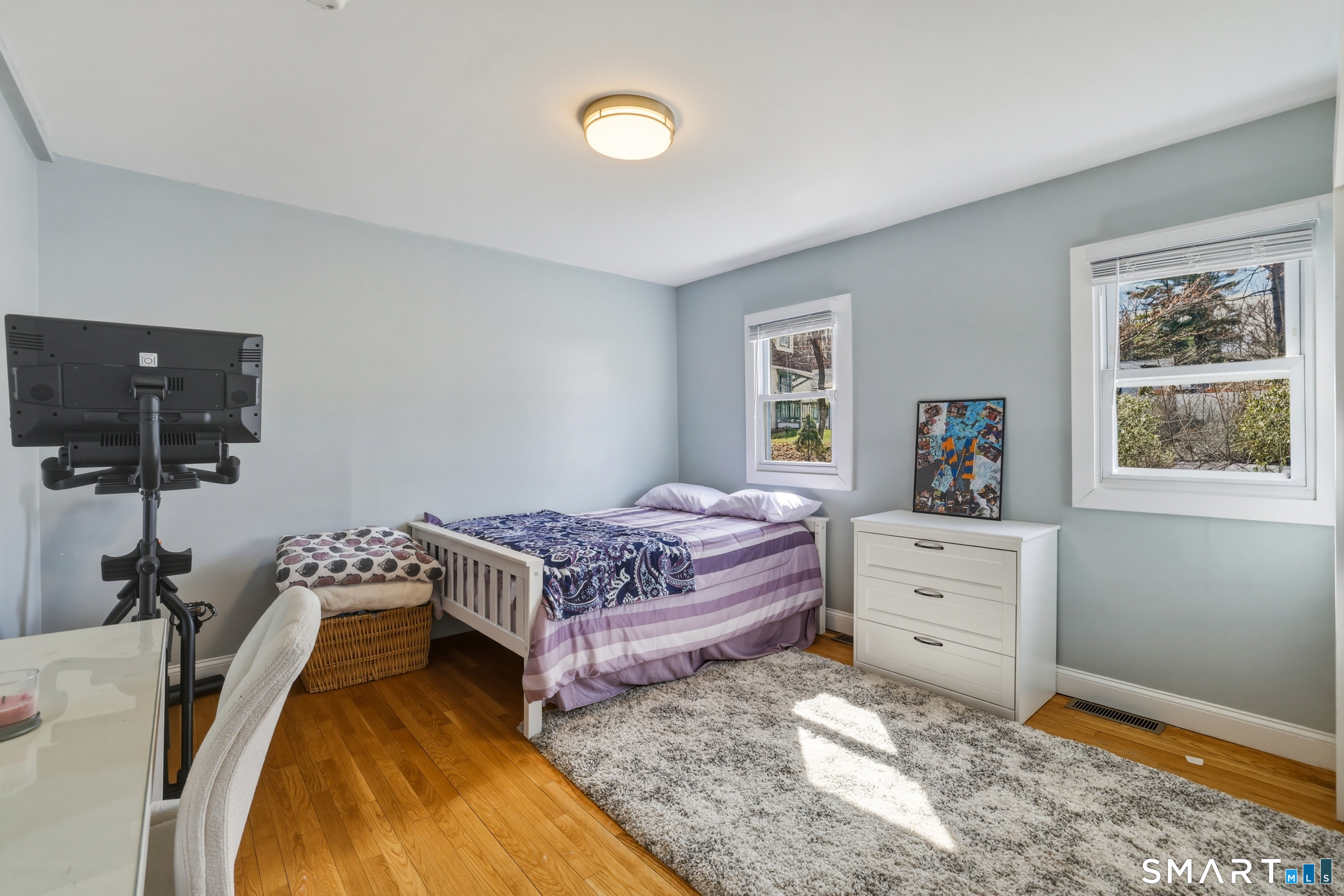15 Cedar Avenue Wolcott, CT 06716 - Photo 12 of 31 a bedroom with a bed and wooden floor