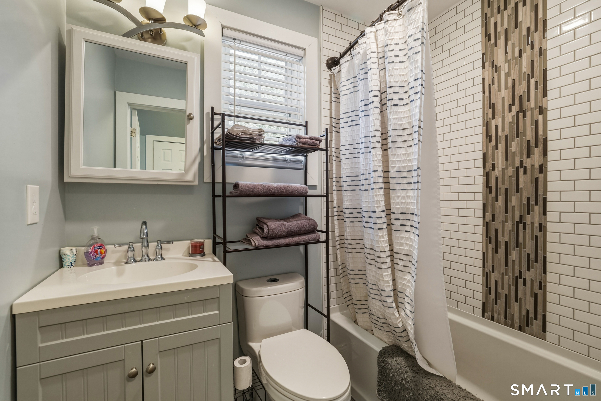 15 Cedar Avenue Wolcott, CT 06716 - Photo 15 of 31 a bathroom with a sink toilet and shower
