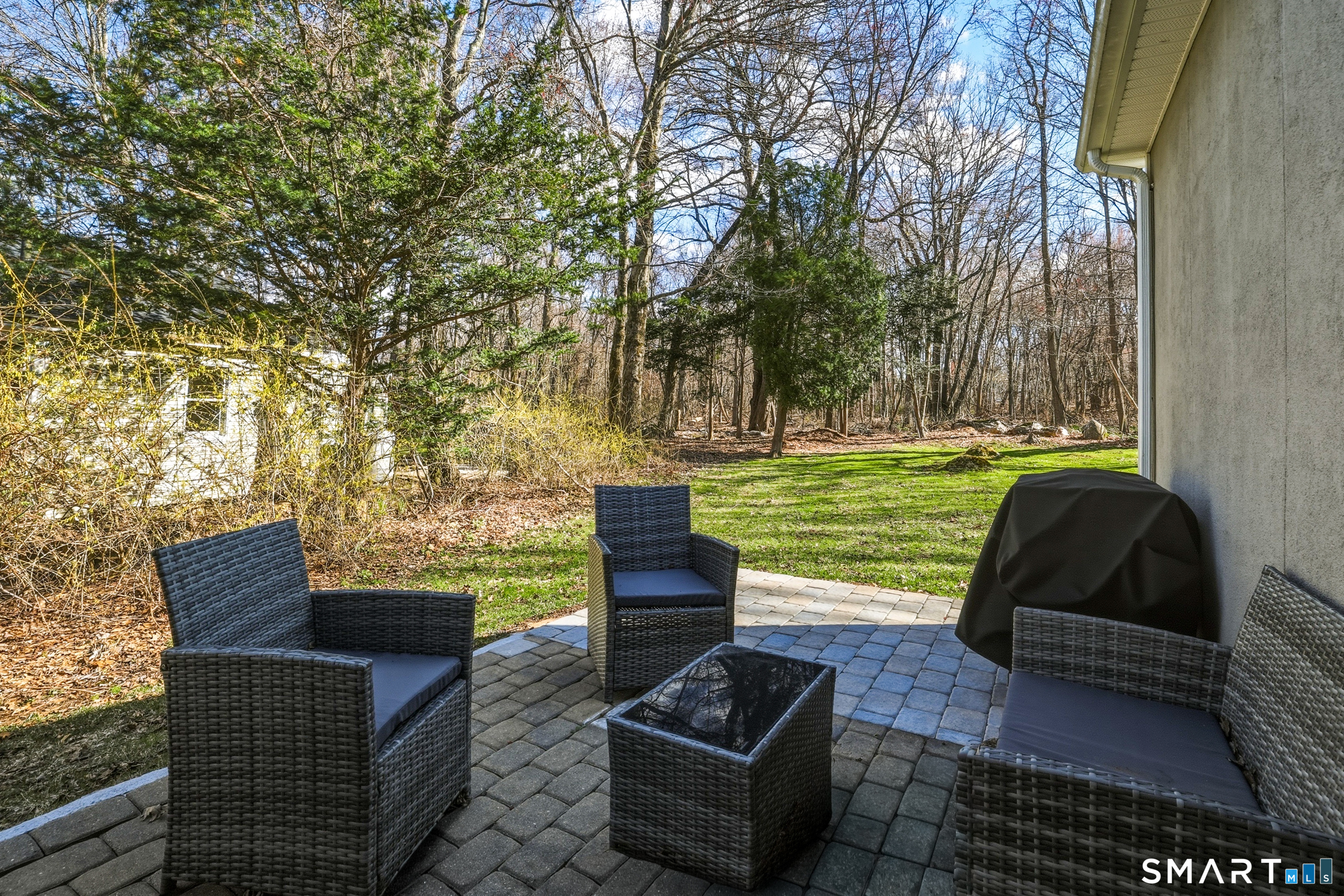 15 Cedar Avenue Wolcott, CT 06716 - Photo 23 of 31 a view of a two chairs and a table in the patio
