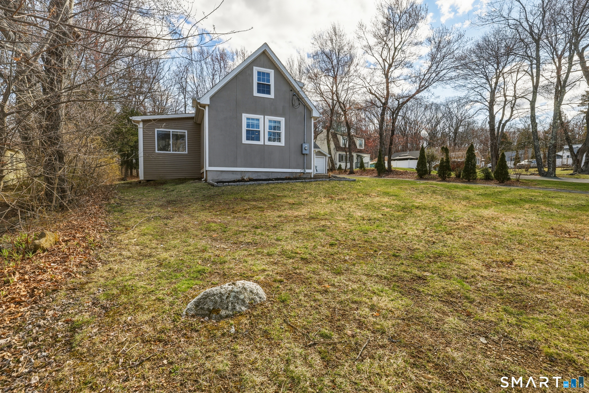 15 Cedar Avenue Wolcott, CT 06716 - Photo 26 of 31 a front view of a house with garden