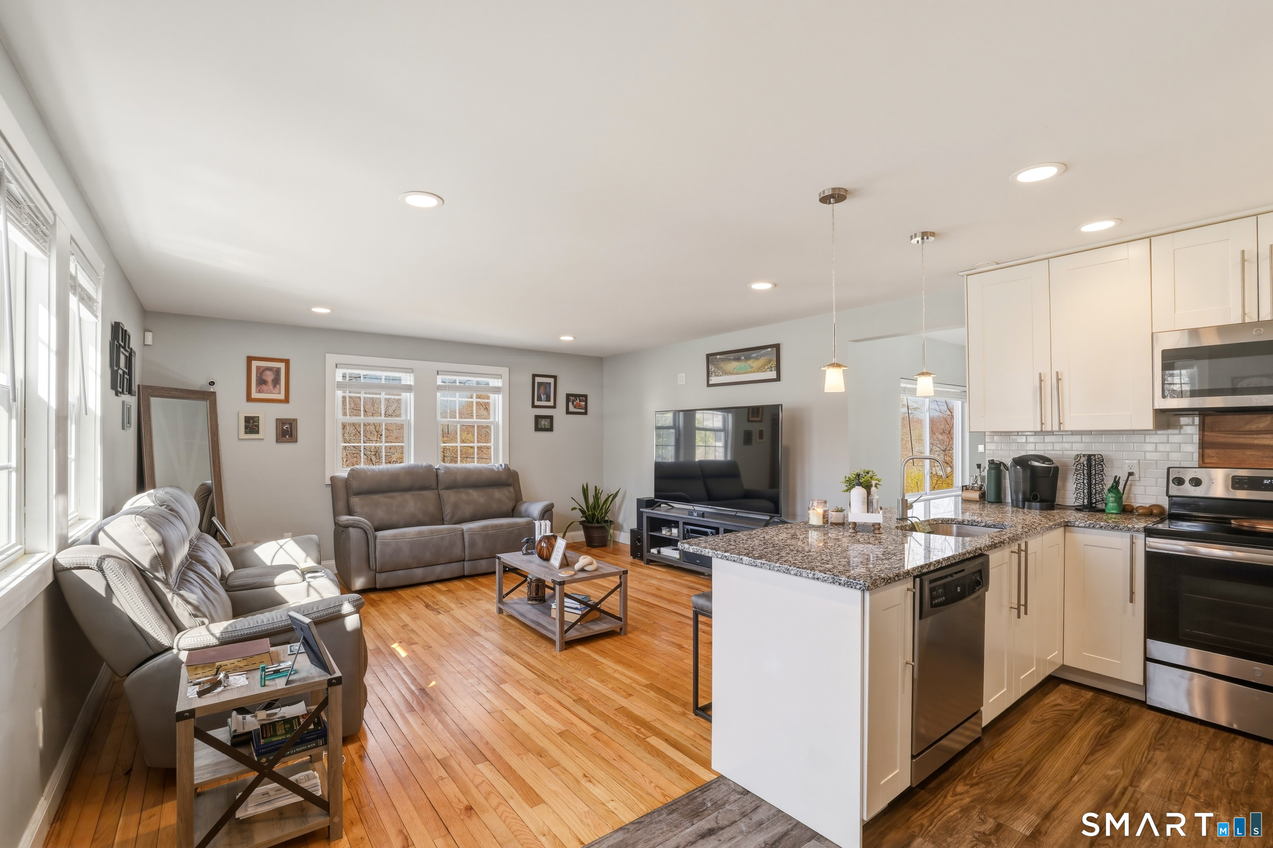 15 Cedar Avenue Wolcott, CT 06716 - Photo 5 of 31 a kitchen that has a sink and a stove top oven