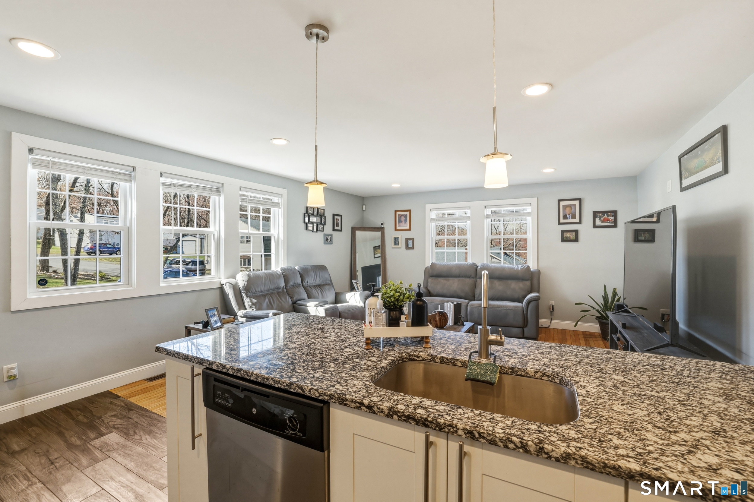 15 Cedar Avenue Wolcott, CT 06716 - Photo 6 of 31 a kitchen with granite countertop a sink and a window