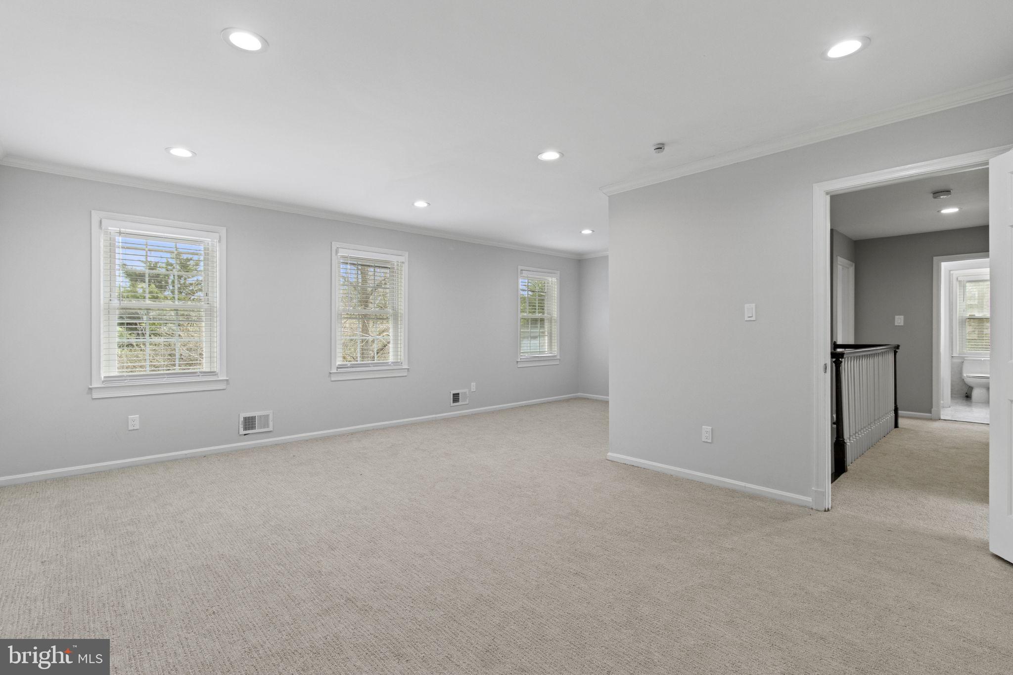 8800 Seven Locks Road Bethesda, MD 20817 - Photo 14 of 33 an empty room with windows and closet
