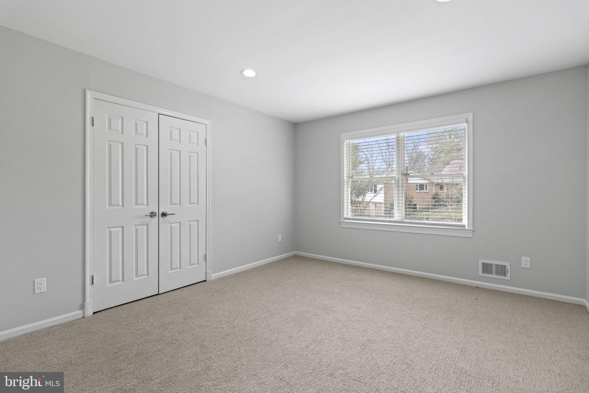 8800 Seven Locks Road Bethesda, MD 20817 - Photo 18 of 33 an empty room with windows