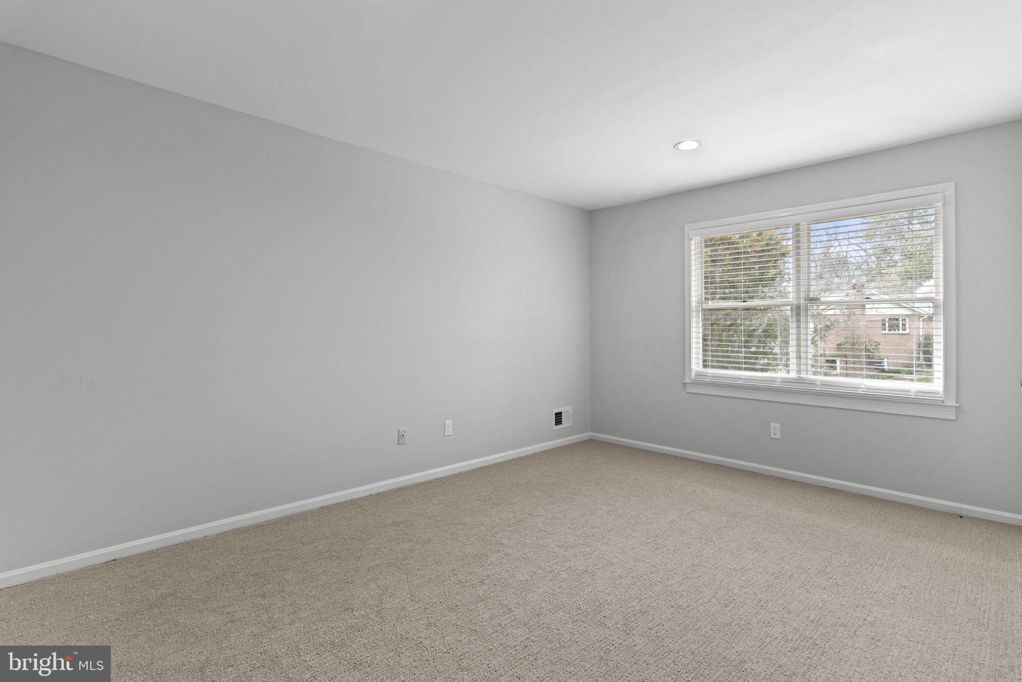 8800 Seven Locks Road Bethesda, MD 20817 - Photo 20 of 33 an empty room with windows