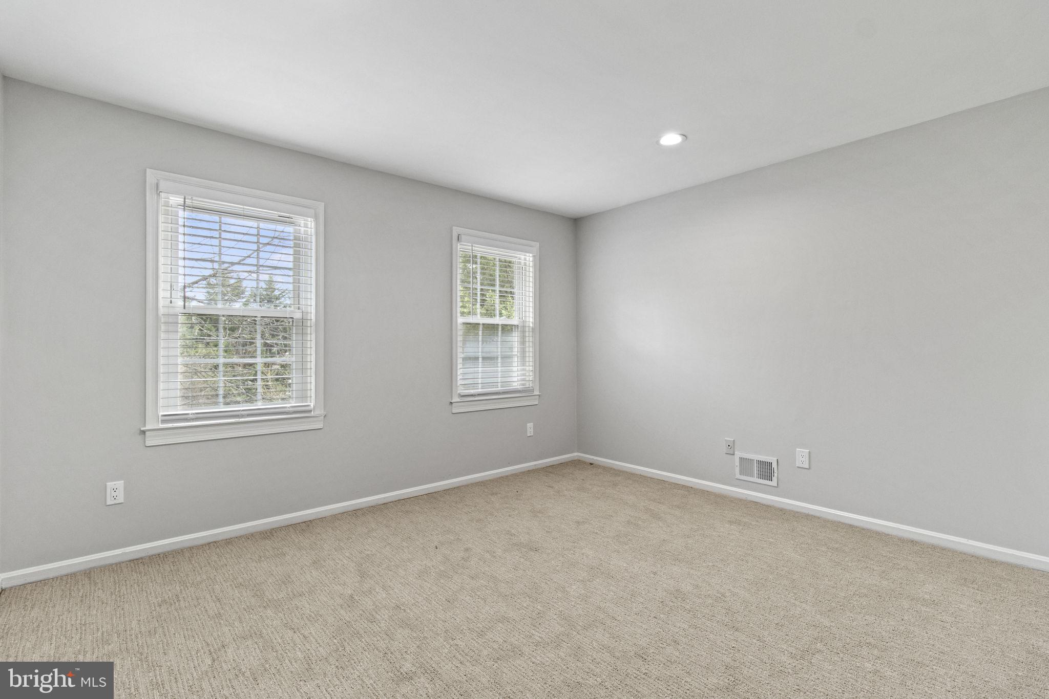8800 Seven Locks Road Bethesda, MD 20817 - Photo 21 of 33 an empty room with windows