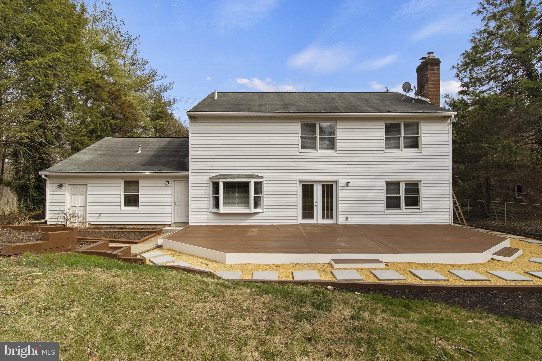 8800 Seven Locks Road Bethesda, MD 20817 - Photo 26 of 33 a view of a house with a yard