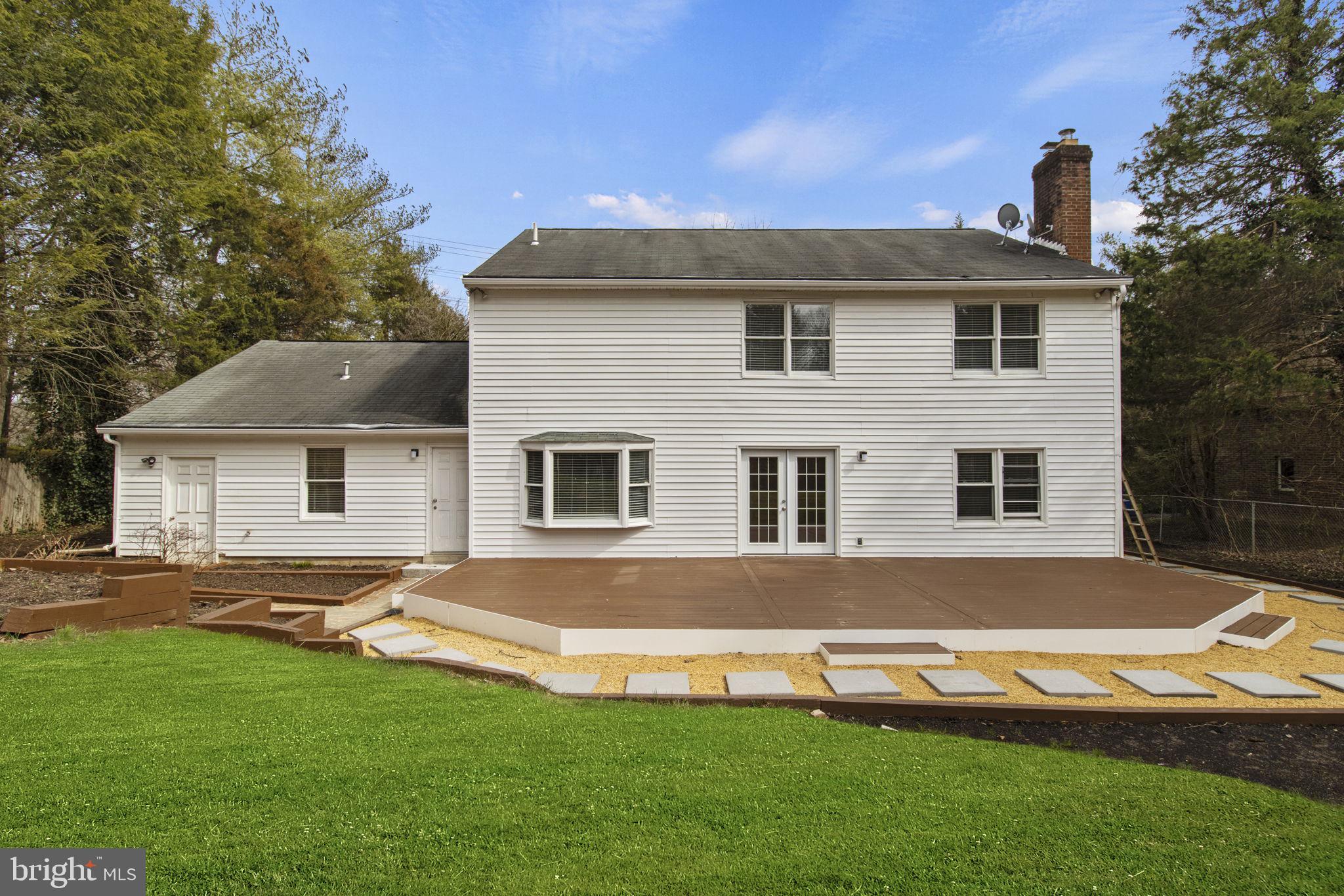 8800 Seven Locks Road Bethesda, MD 20817 - Photo 27 of 33 a front view of a house with a yard