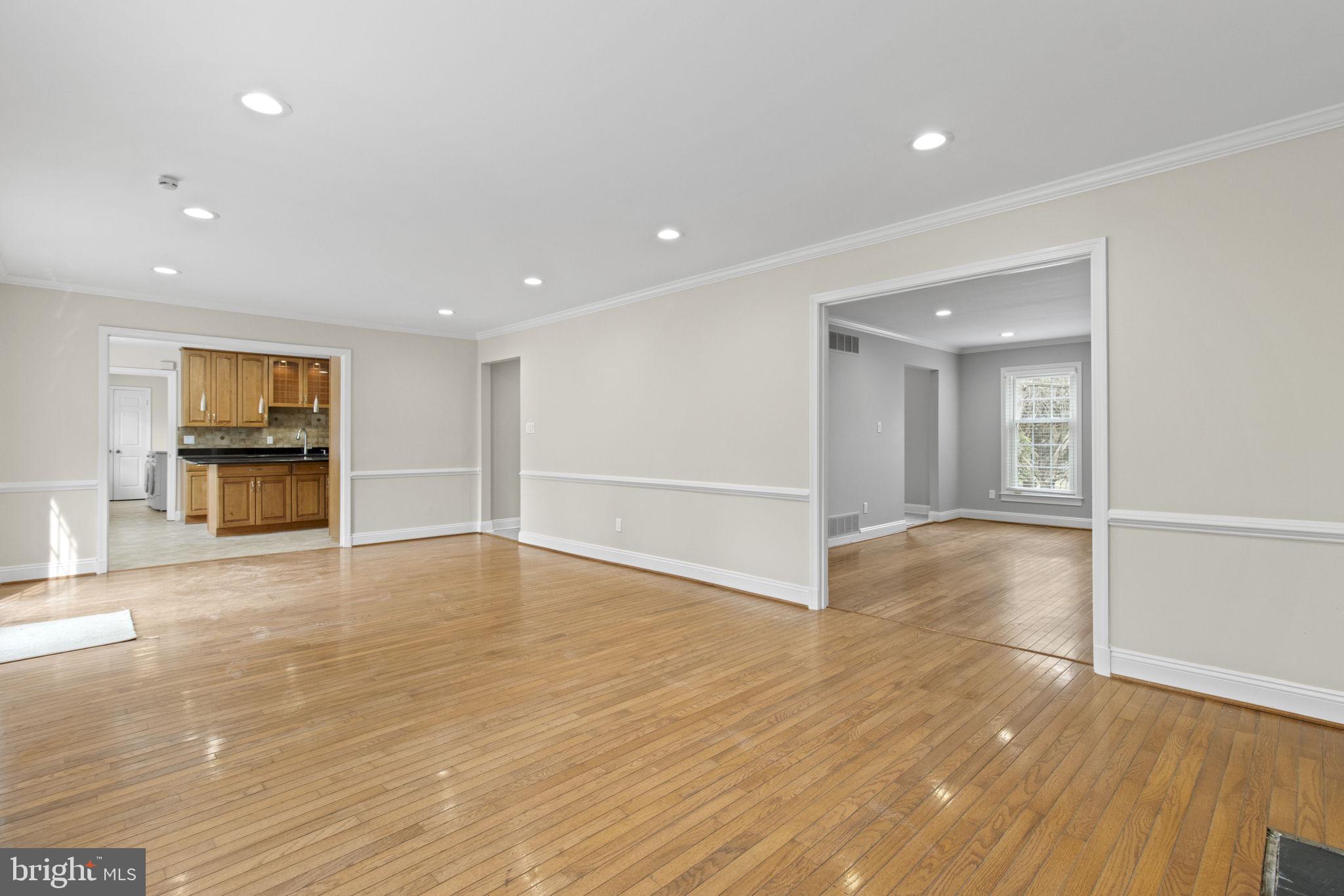 8800 Seven Locks Road Bethesda, MD 20817 - Photo 5 of 33 a view of empty room with wooden floor