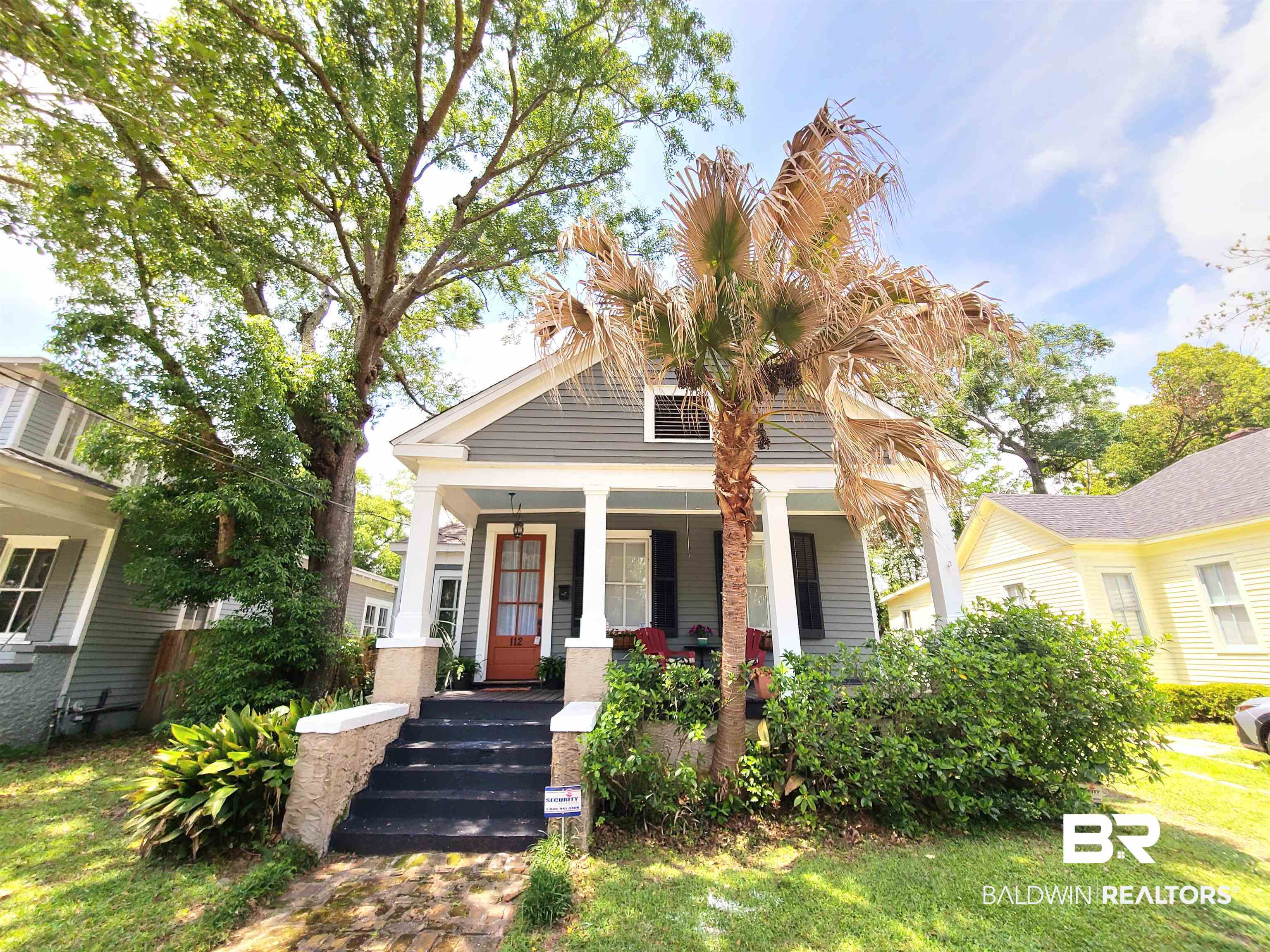 112 Espejo Street Mobile, AL 36604 - Photo 20 of 20 View of front of property featuring a porch and a front yard