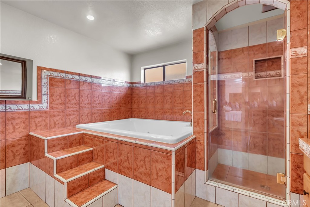 1324 East Turmont Street Carson, CA 90746 - Photo 42 of 47 a bathroom with a sink and a shower