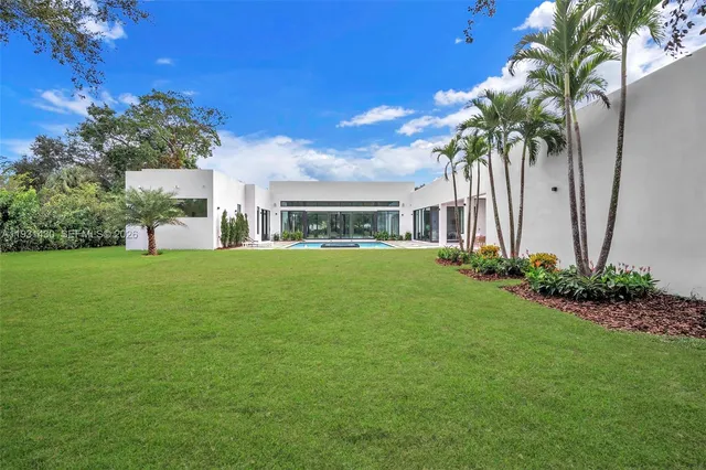 a house view with a garden space