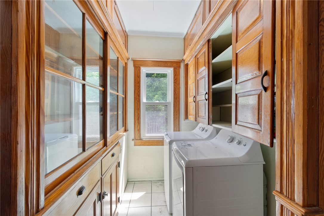 1960 Ridge Road Ontario, NY 14519 - Photo 23 of 43 THE FIRST FLOOR LAUNDRY WITH SO MUCH STORAGE! RIGH