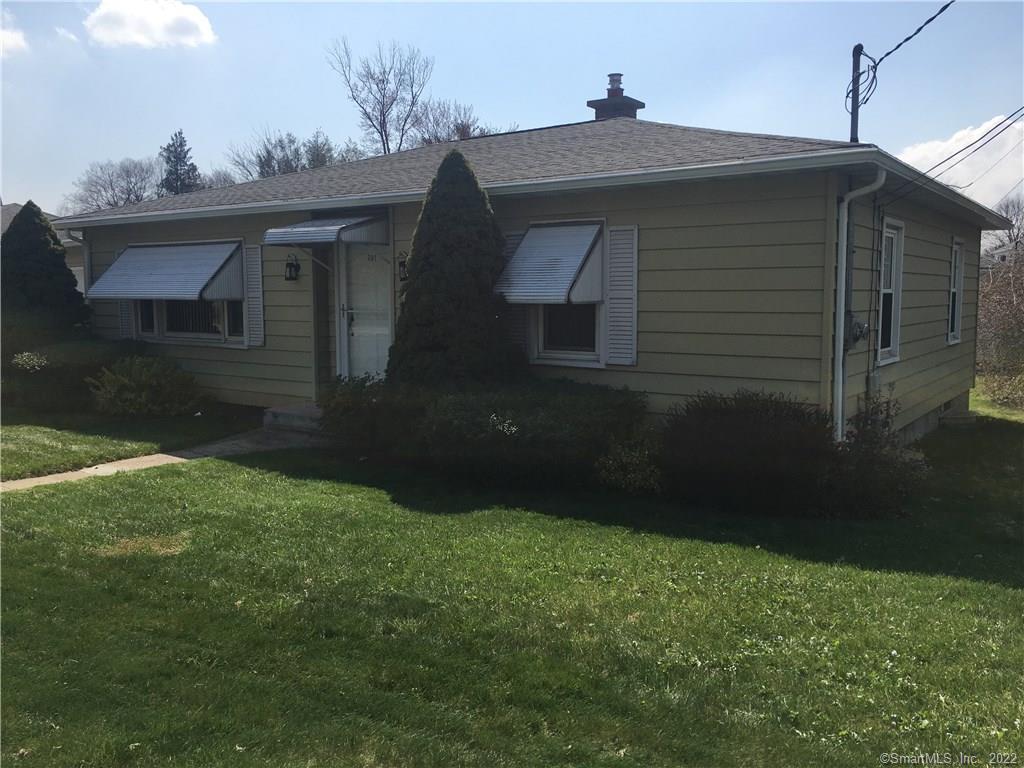 391 Frost Road Waterbury, CT 06705 - Photo 1 of 1 a front view of a house with a yard