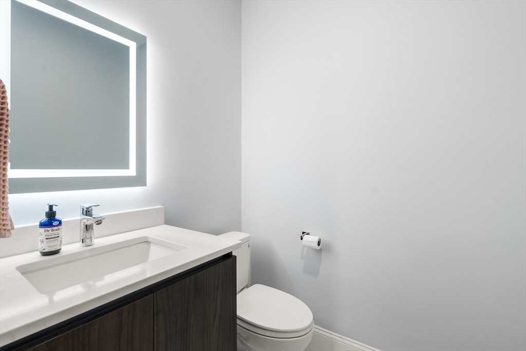 32 Pearl Street, Unit 4 Boston, MA 02125 - Photo 6 of 35 a bathroom with a sink and a toilet