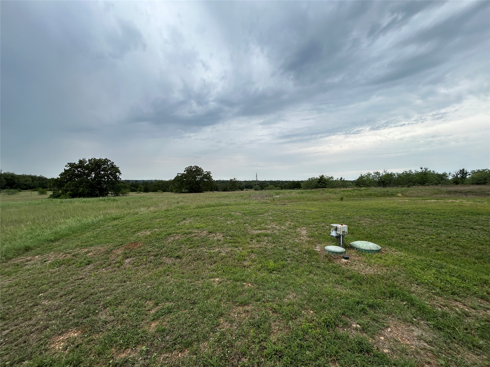 136 Fm 2239 Road Paige, TX 78659 - Photo 20 of 29 a view of a lake with houses in the back