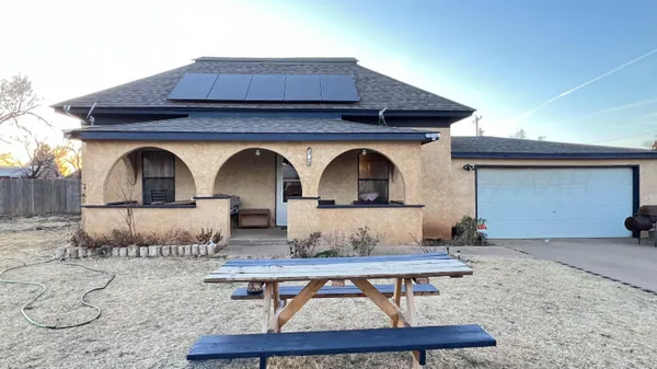 a view of house that has two windows