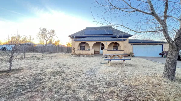 a house view with a outdoor space