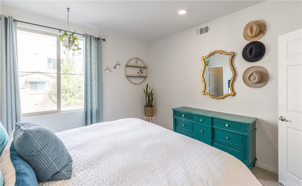 75 Plateau Irvine, CA 92618 - Photo 17 of 29 a bedroom with a bed and a window