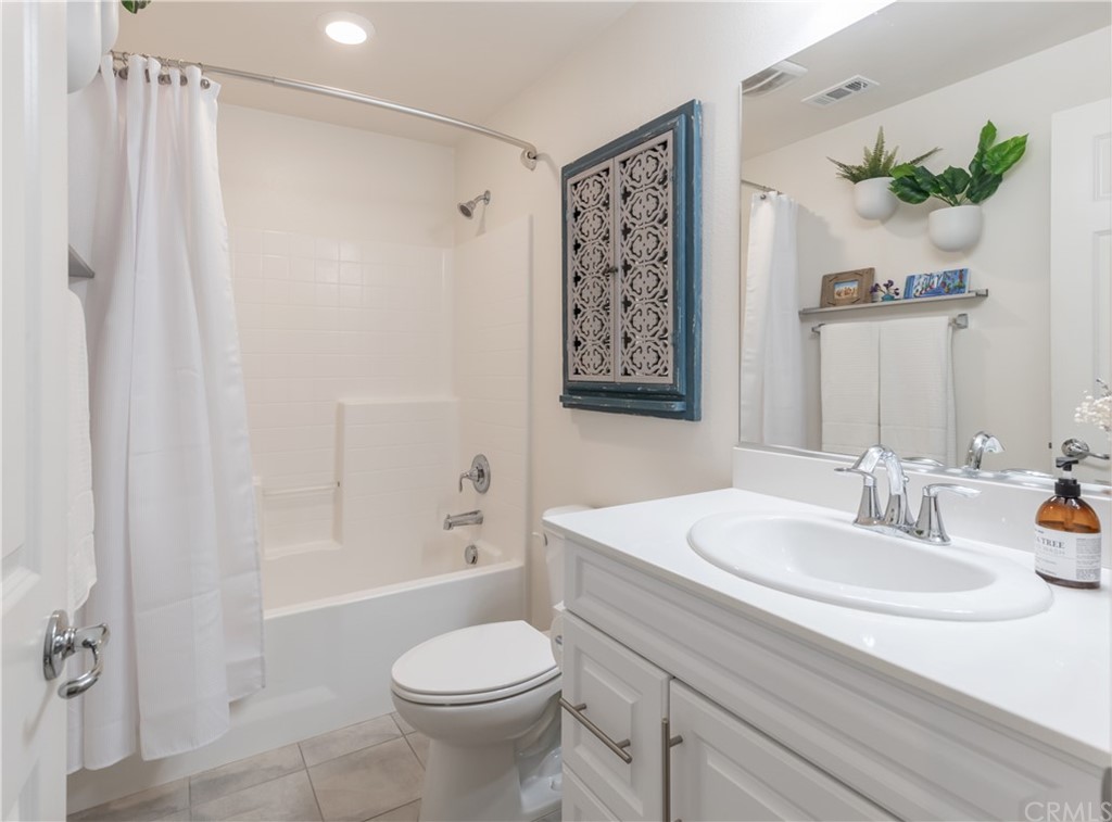 75 Plateau Irvine, CA 92618 - Photo 18 of 29 a bathroom with a sink a toilet and shower