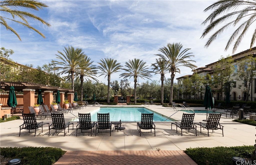 75 Plateau Irvine, CA 92618 - Photo 27 of 29 a view of a swimming pool with chairs