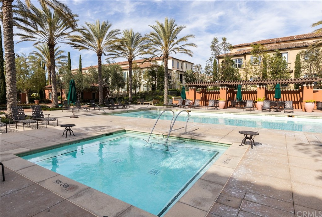 75 Plateau Irvine, CA 92618 - Photo 29 of 29 a view of outdoor space with seating area and swimming pool