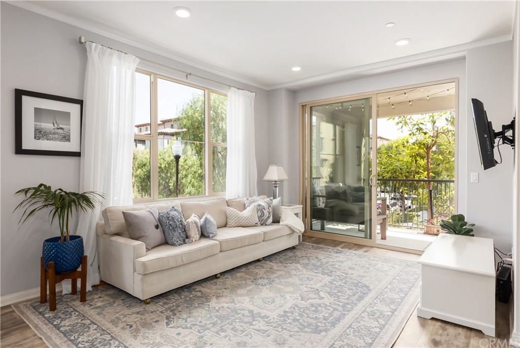 75 Plateau Irvine, CA 92618 - Photo 6 of 29 a living room with furniture and a large window